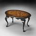 Butler Artists Originals Black & Tan Oval Cocktail Table